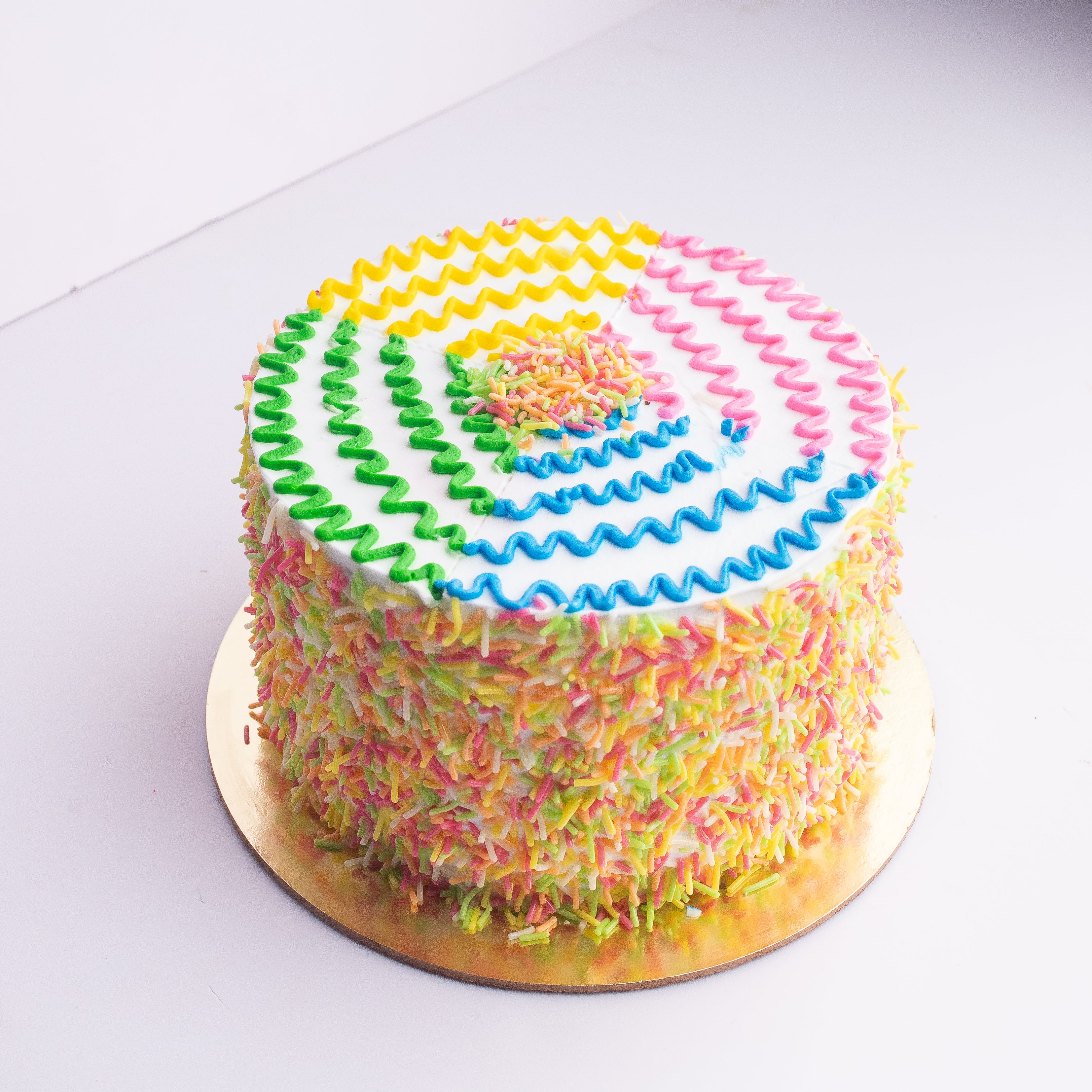 The Perfect Rainbow Cake with Swiss Meringue Buttercream (7 Colors) - Veena  Azmanov